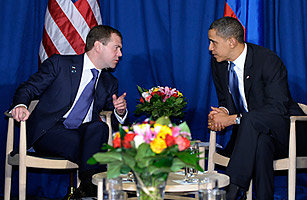 Russian President Dmitri Medvedev and President Obama talk during a meeting at the United Nations Climate Change Conference at the Bella Centre in Copenhagen on Friday, Dec. 18, 2009 